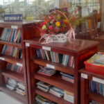 Sparse bookshelves Phan Van Dang school library Vietnam book shortage secondary high school